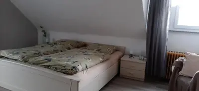 Ein Bett oder Betten in einem Zimmer der Unterkunft Ferienwohnung Gutowski