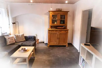 Ein Sitzbereich in der Unterkunft Ferienwohnung Sonnenuhr