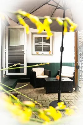 Ein Sitzbereich in der Unterkunft Ferienwohnung Sonnenuhr