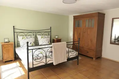 Ein Bett oder Betten in einem Zimmer der Unterkunft Ferienwohnung im Brohlbachtal