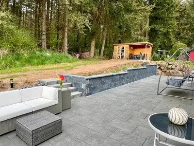 Ein Garten an der Unterkunft Ferienhaus Waldblick