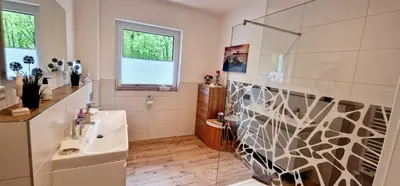 Ein Badezimmer in der Unterkunft Ferienhaus Waldblick