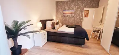 Ein Bett oder Betten in einem Zimmer der Unterkunft Ferienhaus Waldblick