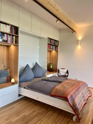 Ein Bett oder Betten in einem Zimmer der Unterkunft Ferienwohnungen Faulhauer