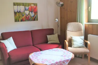 Ein Sitzbereich in der Unterkunft Ferienwohnung Hofmann