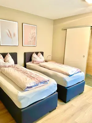 Ein Bett oder Betten in einem Zimmer der Unterkunft Gästehaus Dobias