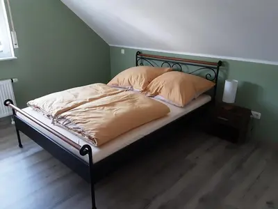 Ein Bett oder Betten in einem Zimmer der Unterkunft Ferienwohnung Grujo