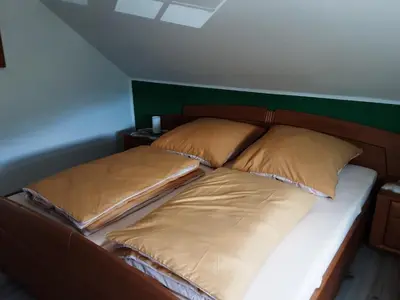 Ein Bett oder Betten in einem Zimmer der Unterkunft Ferienwohnung Grujo