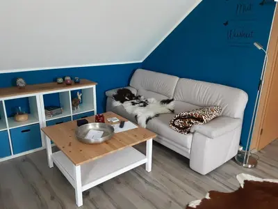Ein Sitzbereich in der Unterkunft Ferienwohnung Grujo