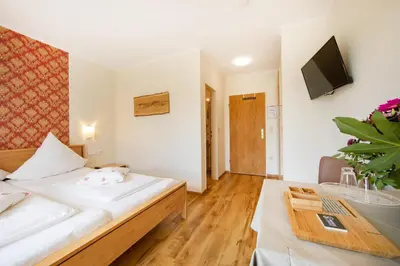 Ein Bett oder Betten in einem Zimmer der Unterkunft Wagners Landhaus