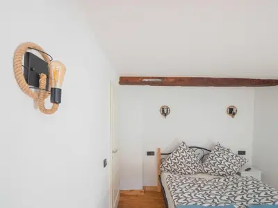 Ein Bett oder Betten in einem Zimmer der Unterkunft Cosy holiday home in Sankt Goarshausen with barbecue