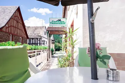 Ein Balkon oder eine Terrasse in der Unterkunft Gasthaus Tannenhof