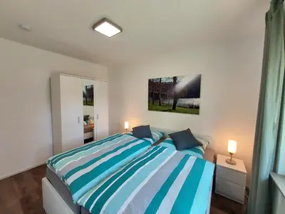 Ein Bett oder Betten in einem Zimmer der Unterkunft Ferienhaus Zum Prinzenkopf