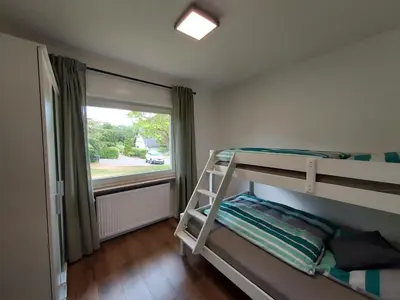 Ein Bett oder Betten in einem Zimmer der Unterkunft Ferienhaus Zum Prinzenkopf