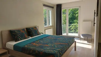 Ein Bett oder Betten in einem Zimmer der Unterkunft Villa Bad Bertrich