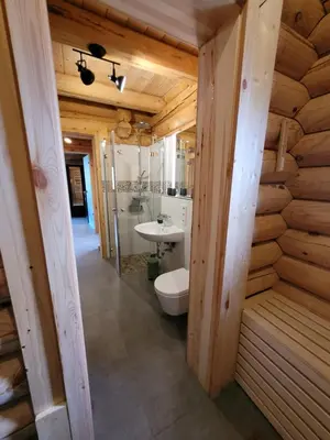 Ein Badezimmer in der Unterkunft Blockhaus Waldsee 8