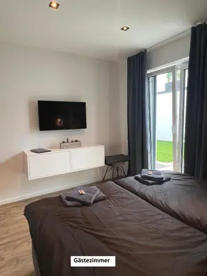Ein Bett oder Betten in einem Zimmer der Unterkunft 