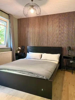 Ein Bett oder Betten in einem Zimmer der Unterkunft JUPAS - Premium Apartments Trier