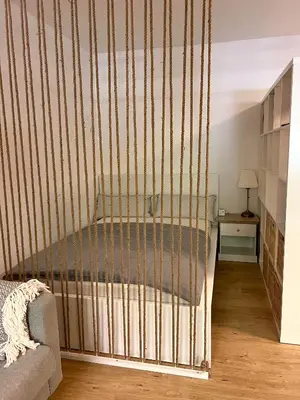 Ein Bett oder Betten in einem Zimmer der Unterkunft JUPAS - Premium Apartments Trier