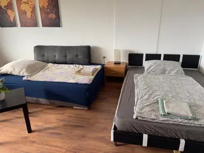 Ein Bett oder Betten in einem Zimmer der Unterkunft B1107, Schönes Appartement mit Traumblick