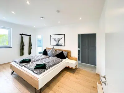 Ein Bett oder Betten in einem Zimmer der Unterkunft The View Suite