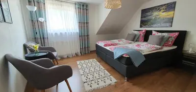 Ein Bett oder Betten in einem Zimmer der Unterkunft Haus Charlotte