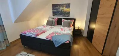 Ein Bett oder Betten in einem Zimmer der Unterkunft Haus Charlotte