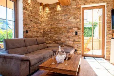 Ein Sitzbereich in der Unterkunft Luxus Ferienwohnung Chalet Seenähe