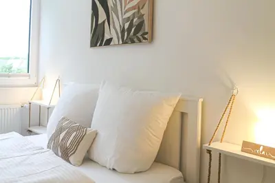 Ein Bett oder Betten in einem Zimmer der Unterkunft Relax Apartment - für Familien, stadtnah, mit Parkplatz