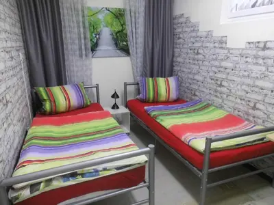 Ein Bett oder Betten in einem Zimmer der Unterkunft Ferienwohnung Eifelpanorama