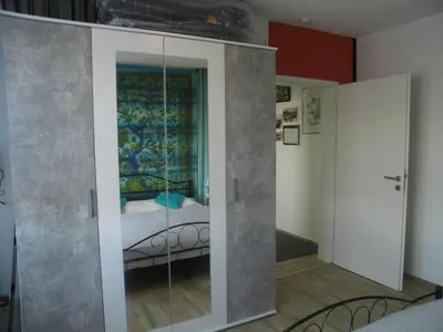 Ein Bett oder Betten in einem Zimmer der Unterkunft Ferienwohnung Eifelpanorama