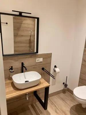 Ein Badezimmer in der Unterkunft Bergs Bahnhof
