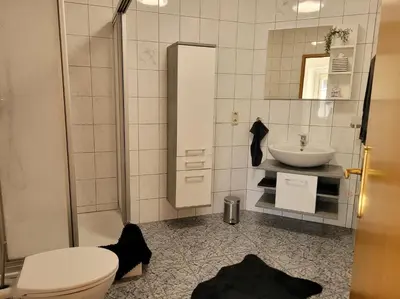 Ein Badezimmer in der Unterkunft Ferienwohnung MIA