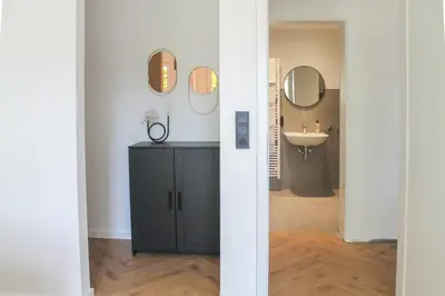 Ein Badezimmer in der Unterkunft Modern Apartment - für Freunde & Familien, stadtnah, Parkplatz, E-Ladestation, Gitterbox für Fahrräder, Fitnessstudio, digitale Gästemappe mit Restaurant- und Unternehmenstipps