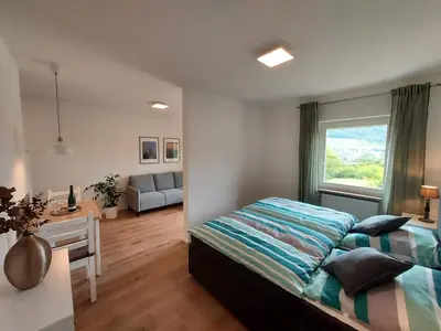 Ein Bett oder Betten in einem Zimmer der Unterkunft Ferienhaus Prinzenkopf