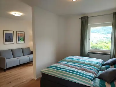 Ein Bett oder Betten in einem Zimmer der Unterkunft Ferienhaus Prinzenkopf