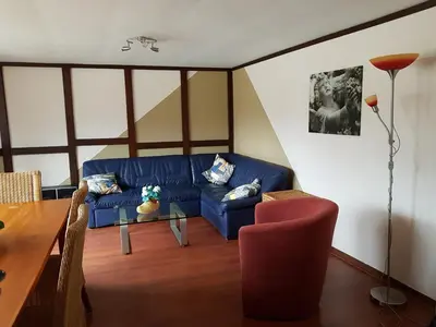 Ein Sitzbereich in der Unterkunft Haus Marlene