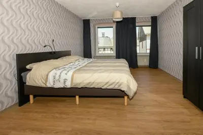 Ein Bett oder Betten in einem Zimmer der Unterkunft Der Eifel Perle Manderscheid