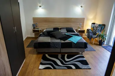 Ein Bett oder Betten in einem Zimmer der Unterkunft Mosel-Apartments-Koblenz