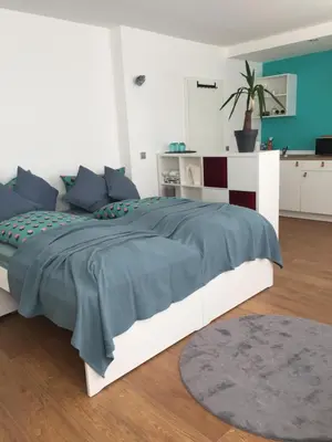 Ein Bett oder Betten in einem Zimmer der Unterkunft Mosel-Apartments-Koblenz