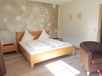 Ein Bett oder Betten in einem Zimmer der Unterkunft Landhaus Goeres