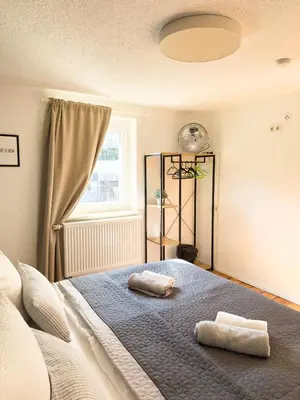Ein Bett oder Betten in einem Zimmer der Unterkunft O&W Ferienhaus mit Pool nähe Nürburgring, Adenau