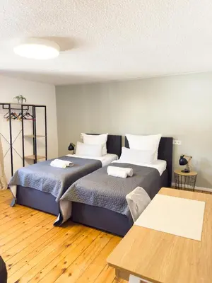 Ein Bett oder Betten in einem Zimmer der Unterkunft O&W Ferienhaus mit Pool nähe Nürburgring, Adenau