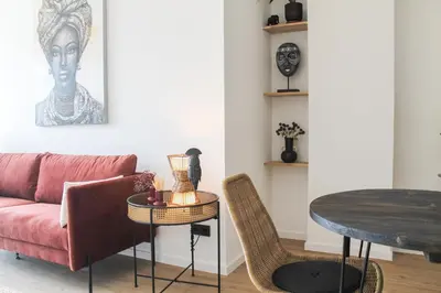 Ein Sitzbereich in der Unterkunft African-Style Apartment - stadtnah, Parkplatz, E-Ladestation für Auto & Fahrräder, Gitterbox für Fahrräder, Fitnessstudio