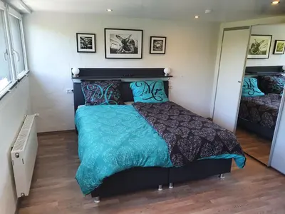 Ein Bett oder Betten in einem Zimmer der Unterkunft Schwarzer Kater Blankenheim