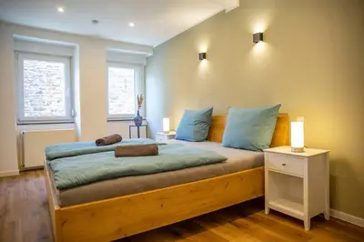 Ein Bett oder Betten in einem Zimmer der Unterkunft Stilvolle Wohnung bei Cochem - 2 Schlafzimmer