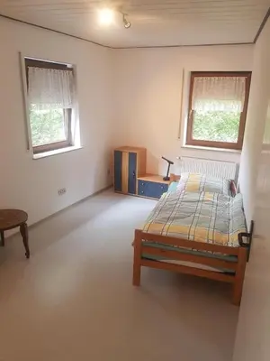 Ein Bett oder Betten in einem Zimmer der Unterkunft Ferienwohnung - a67931