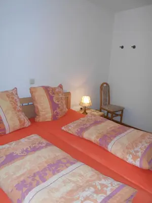 Ein Bett oder Betten in einem Zimmer der Unterkunft Wohnung Feuerberg mit Südbalkon