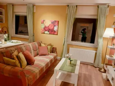 Ein Sitzbereich in der Unterkunft Schöne Ferienwohnung mit Balkon und Garten