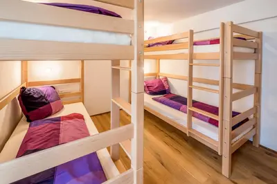 Ein Bett oder Betten in einem Zimmer der Unterkunft Nengshof Ferienwohnungen Pusteblume und Butterblume